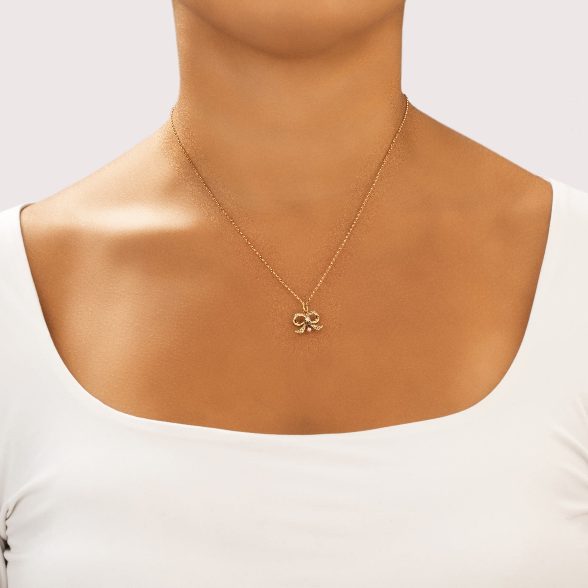 Antique-Style Victorian Gold Tone Old Mine Cut Simulated Diamond Faux Pearl Bow Charm / Pendant